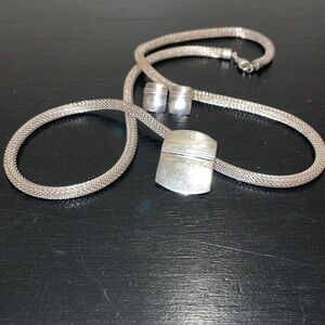 Silver Pendant on Mesh Necklace with matching earrings.‎